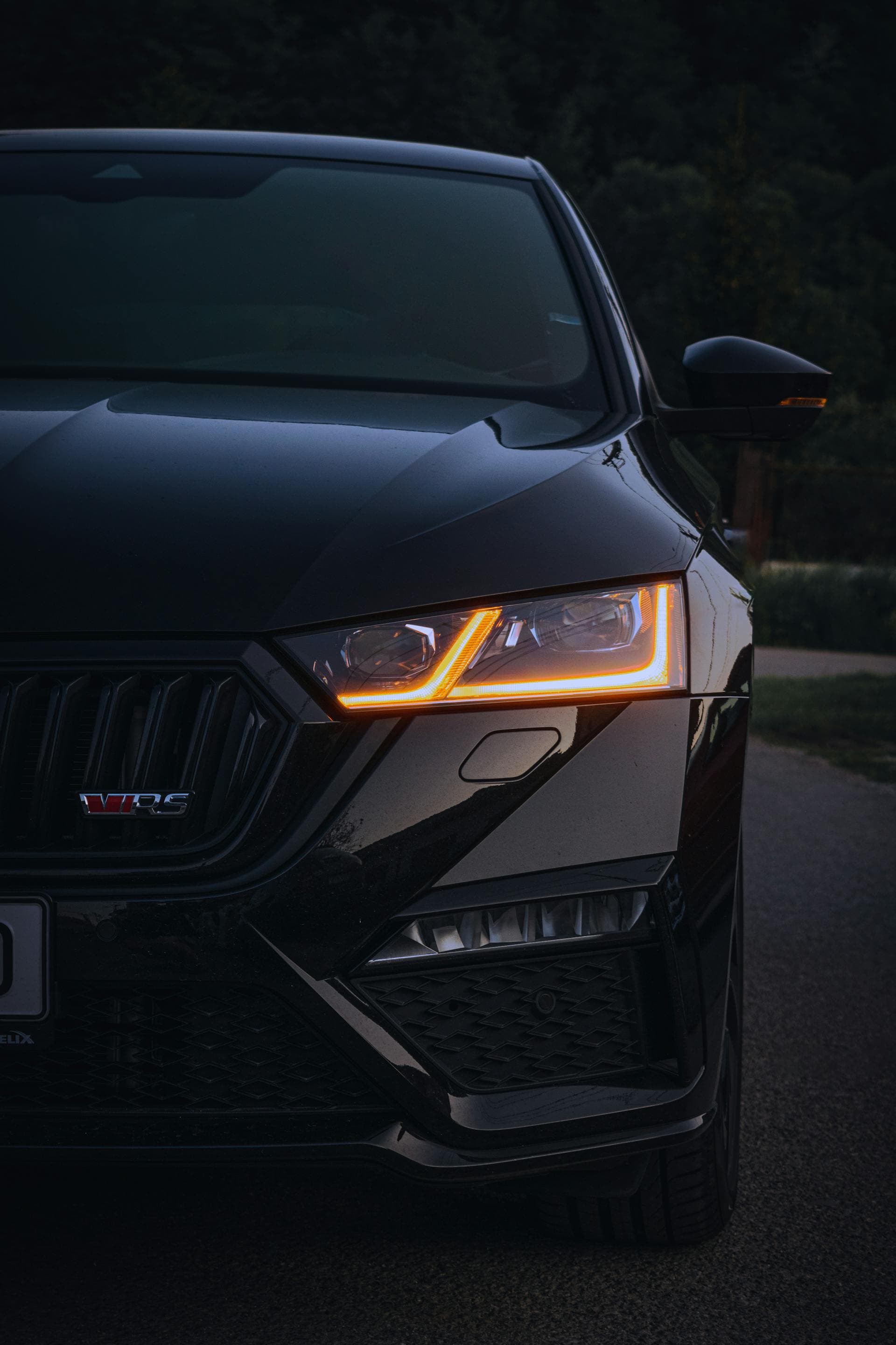 Premium black performance car front view